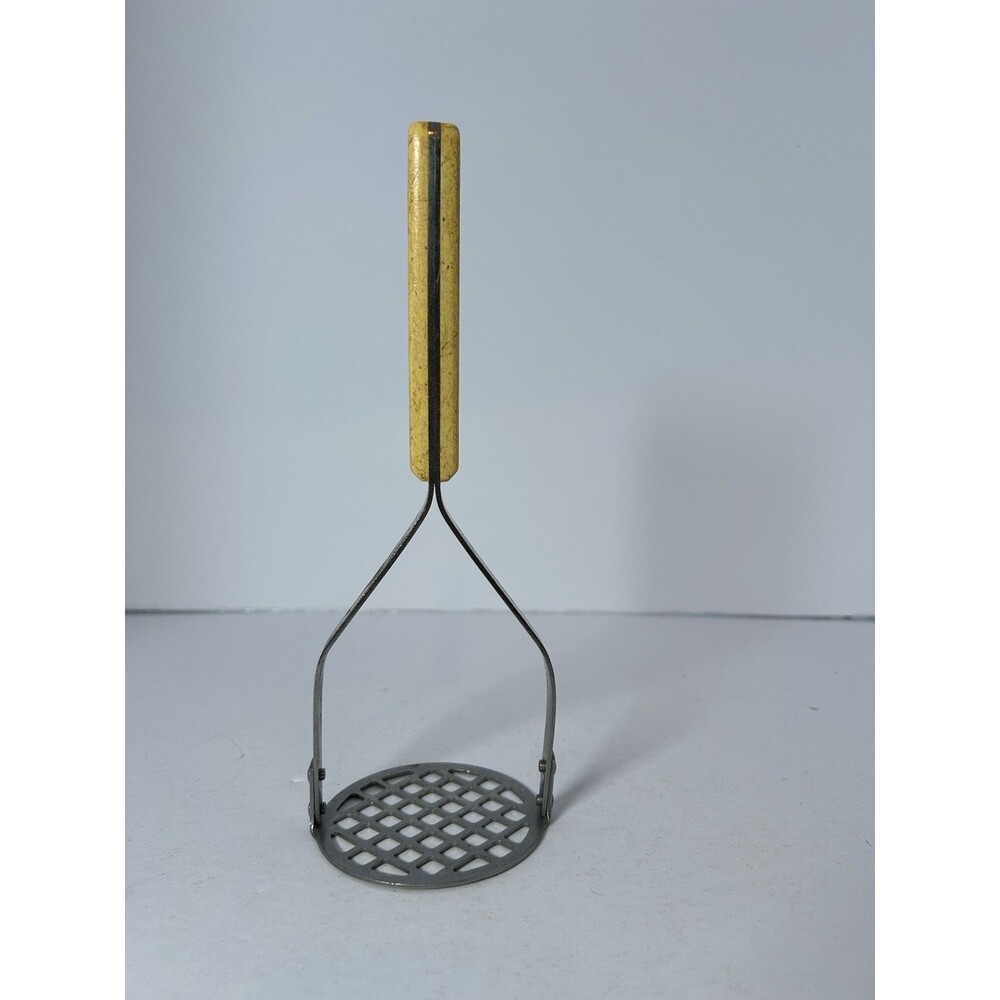 Vintage Flint Stainless Vanadium Yellowish color Handle Potato Masher USA 9.5”